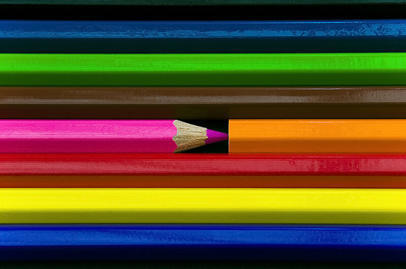 Colored pencils arranged in a circle
